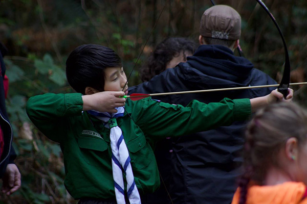 Youth practising archery