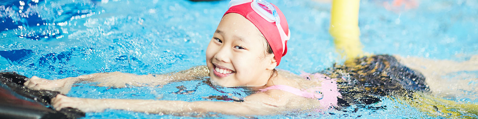 A girl enjoying swimming at summer camps